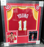 Trae Young Signed Framed Hawks Jersey With Logo and Photos Beckett Authenticated