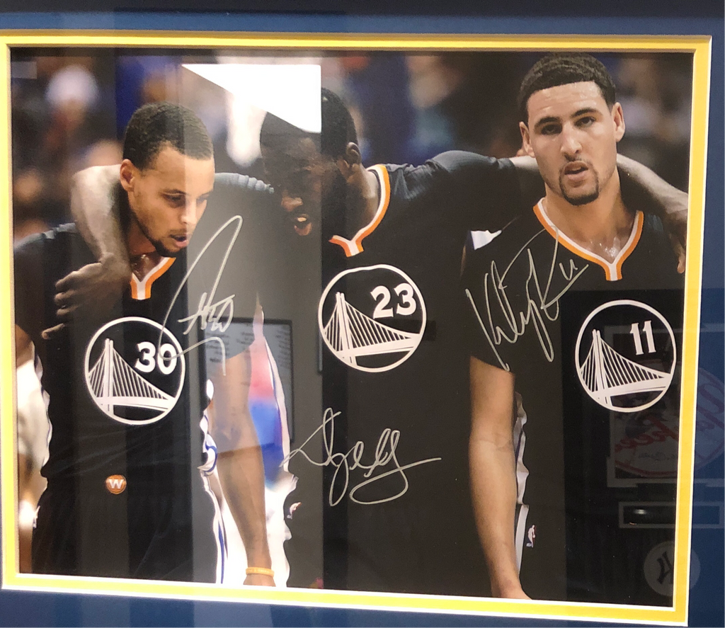 Steph Curry Autographed and Framed Golden State Warriros Jersey