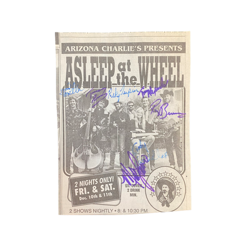 Asleep at the Wheel signed newspaper clipping